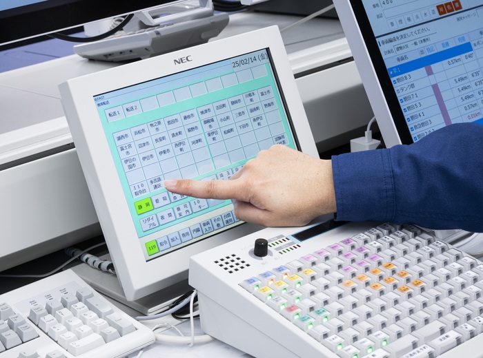 写真：119番通報等における多言語通訳体制